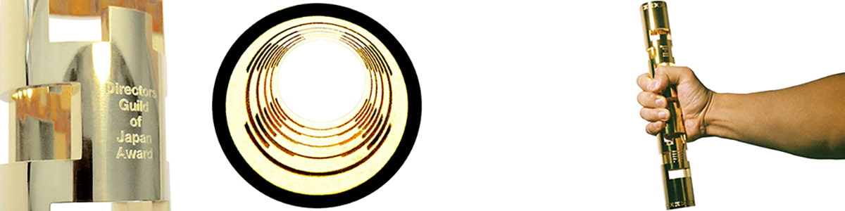 人型を連続させ陸上競技のバトンサイズにしたてたトロフィの画像